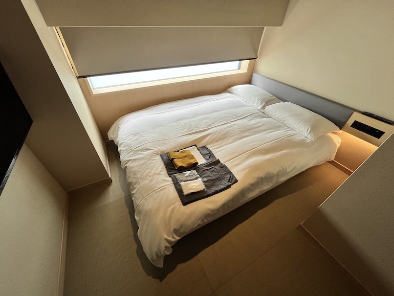 温泉旅館 由縁 新宿の客室：寝室（ベッド）